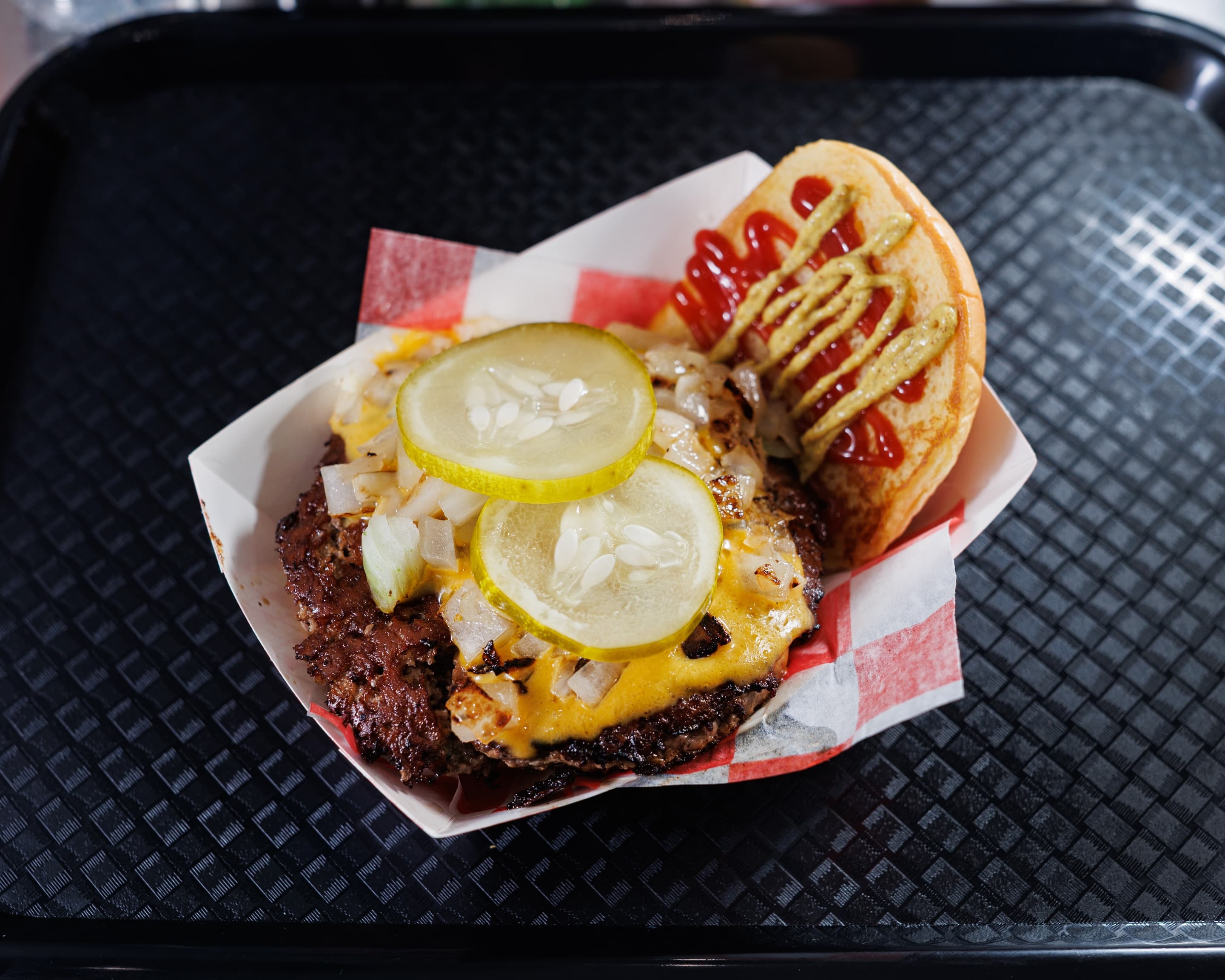 8oz Big Boy smash burger with melted cheese, pickles, onions and ketchup on a Martin's potato bun